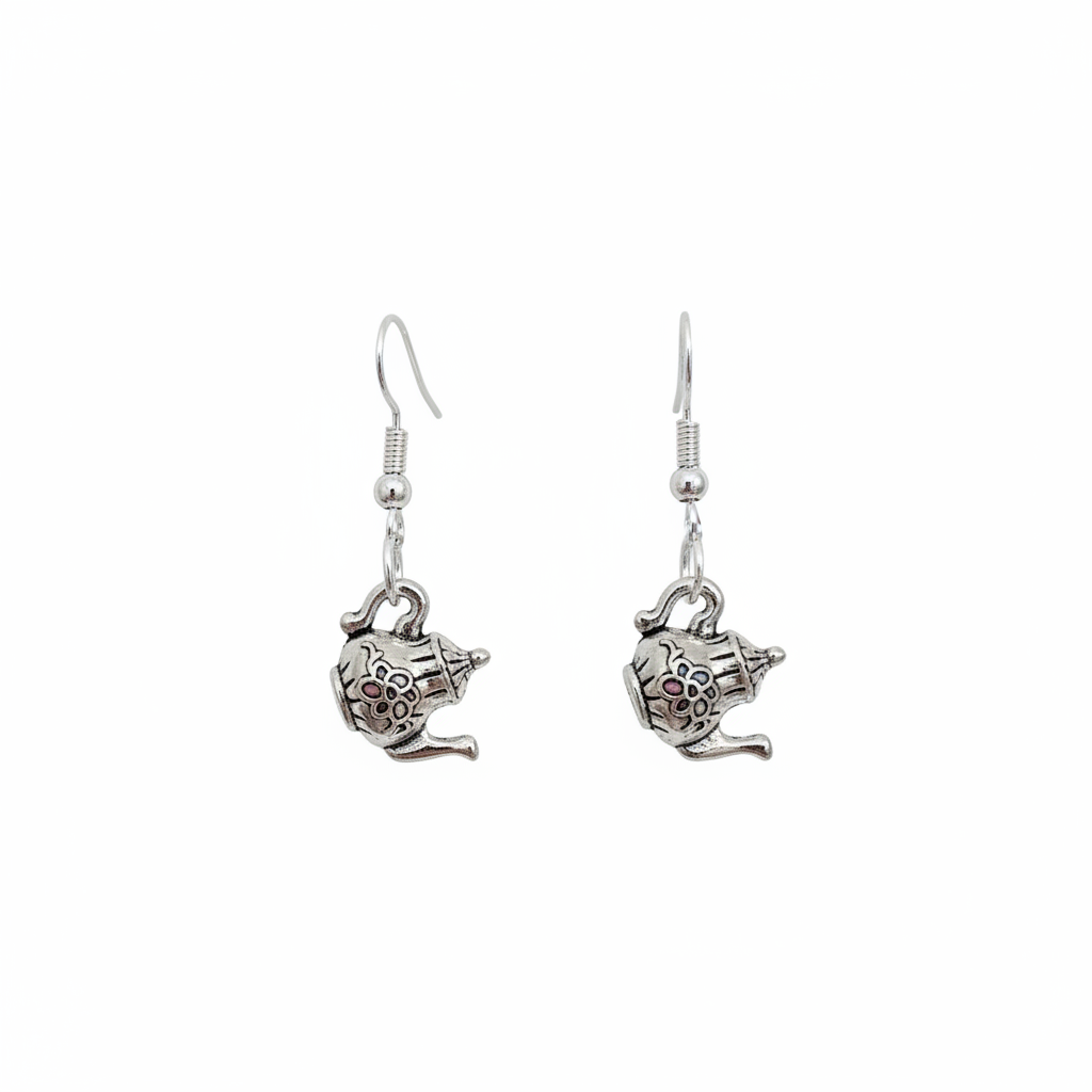 Silver teapot-shaped earrings on a white background